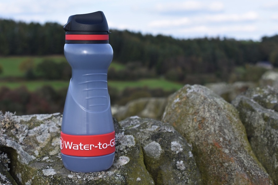 Water-to-Go filter bottle on drystone wall